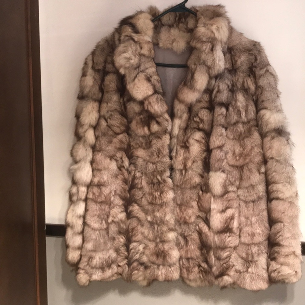 No bundle, genuine fur coat.  No rips or tears